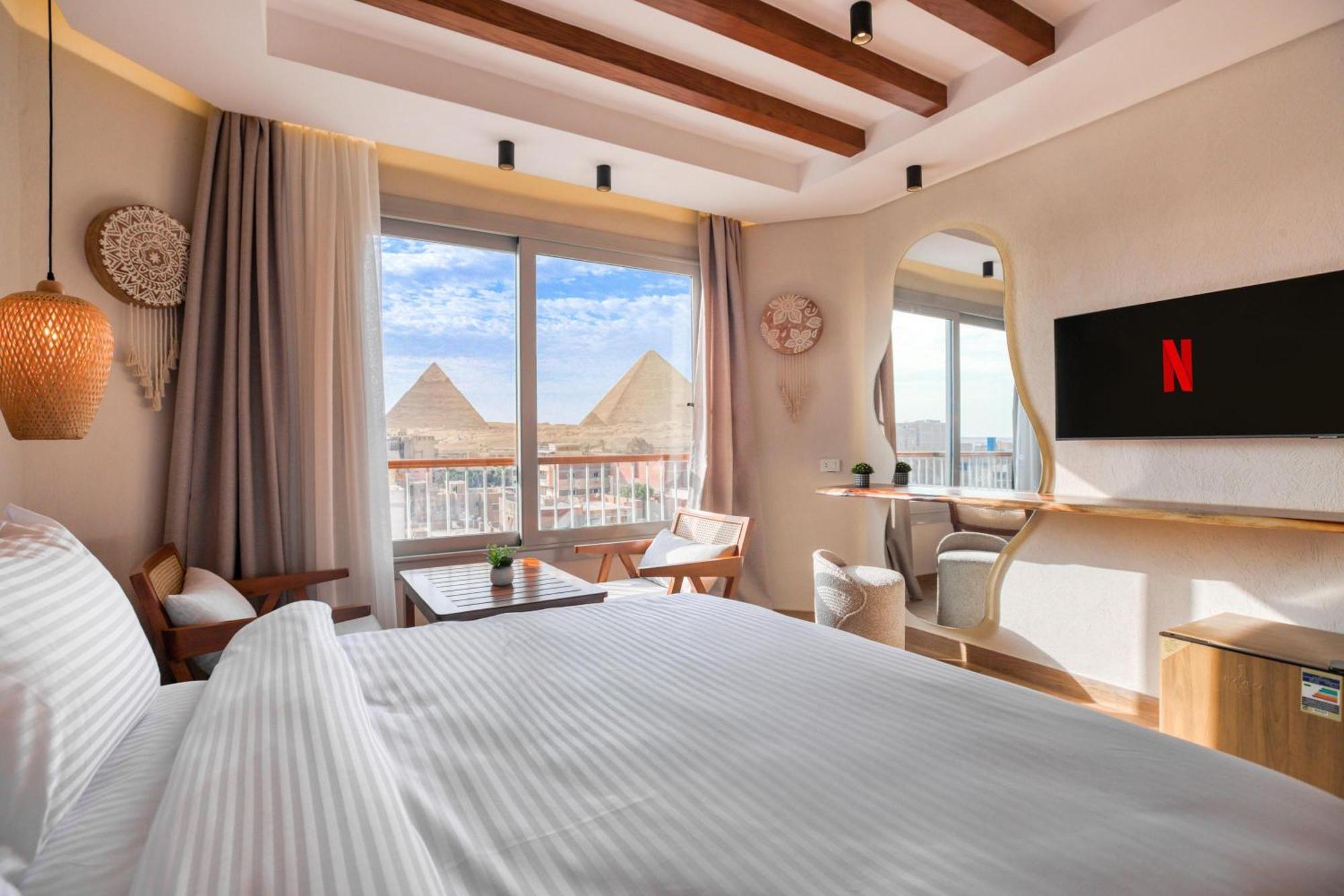 Galaxy Pyramids View Inn Kafret el-Gabal Kültér fotó